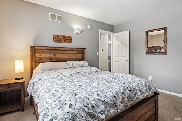 bedroom featuring carpet, visible vents, and baseboards