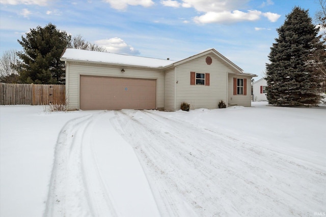 ranch-style house featuring an attached garage