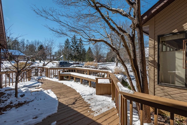 view of snow covered deck