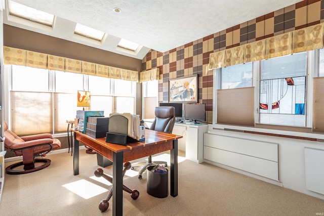 home office with light carpet, vaulted ceiling, a textured ceiling, and wallpapered walls