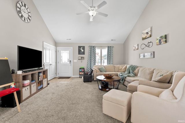 living room featuring light colored carpet, visible vents, a ceiling fan, high vaulted ceiling, and baseboards