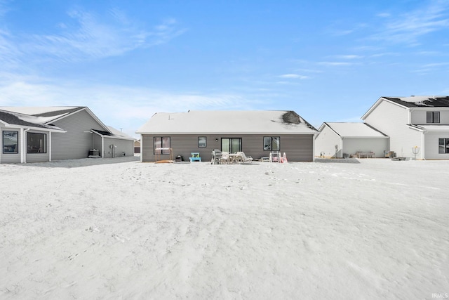 view of snow covered property