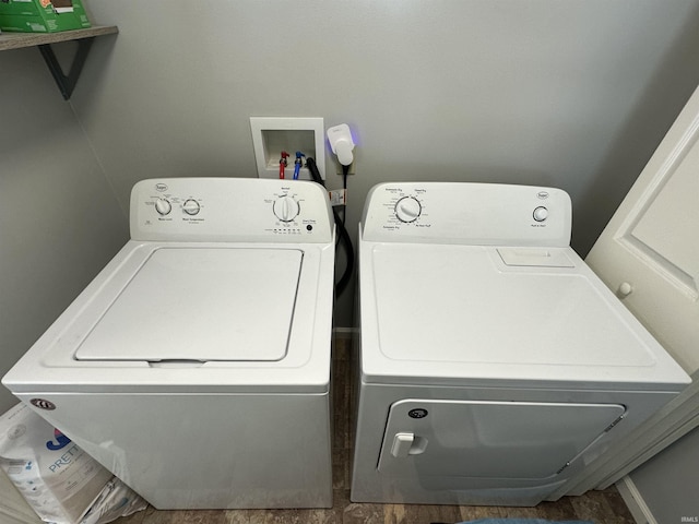 washroom with laundry area and washing machine and clothes dryer