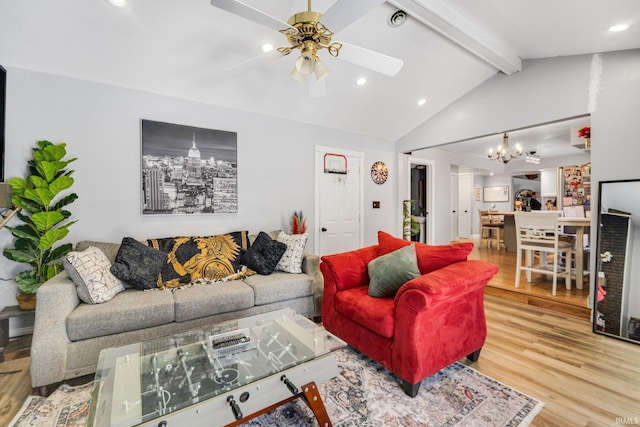 living area featuring vaulted ceiling with beams, a ceiling fan, wood finished floors, and recessed lighting