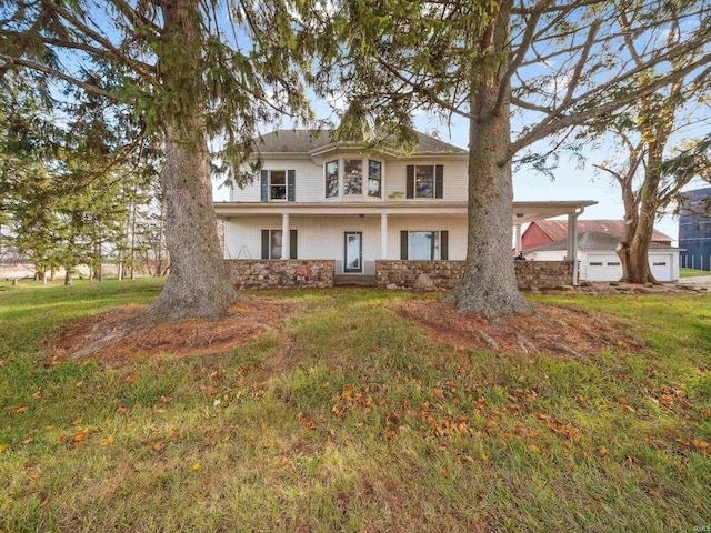 view of front of home with stone siding, a front lawn, and stucco siding