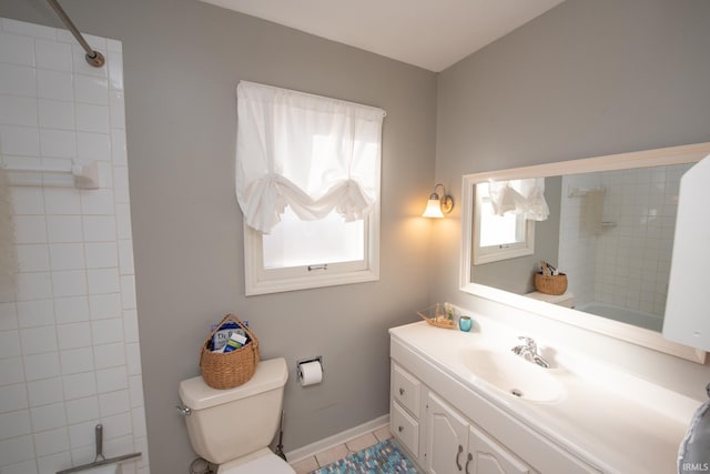 full bathroom featuring a shower, vanity, toilet, and tile patterned floors