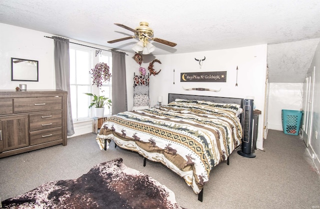 bedroom featuring light carpet, ceiling fan, and a textured ceiling