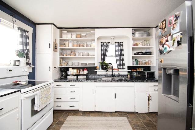 kitchen with a sink, white cabinetry, white range with electric stovetop, stainless steel fridge with ice dispenser, and open shelves