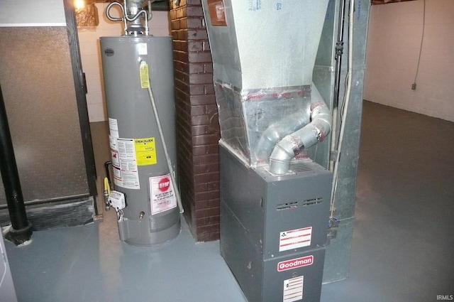 utility room featuring gas water heater