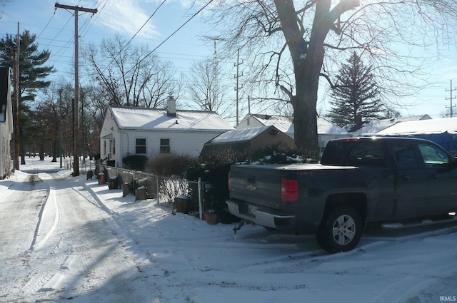 view of snow covered property