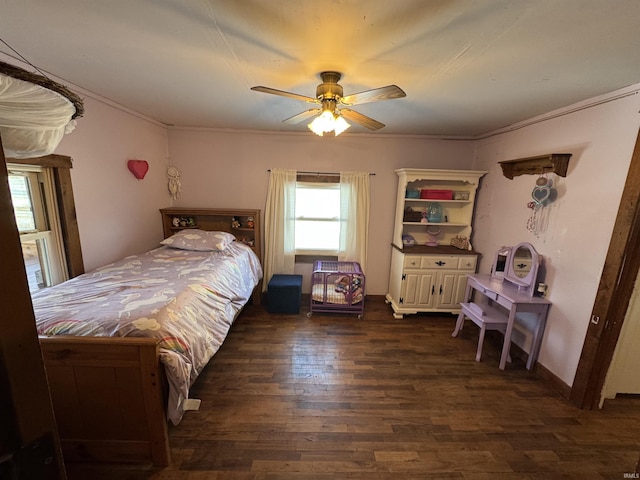 bedroom with ceiling fan, dark wood-style flooring, and crown molding