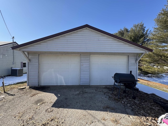 detached garage featuring central AC