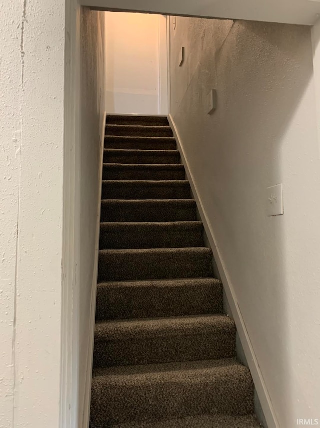 stairs with baseboards