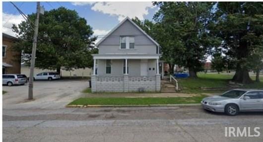 209 N 2nd Ave, Evansville, IN 47710 - view of front of house featuring a porch