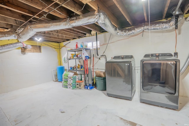 basement with washing machine and dryer