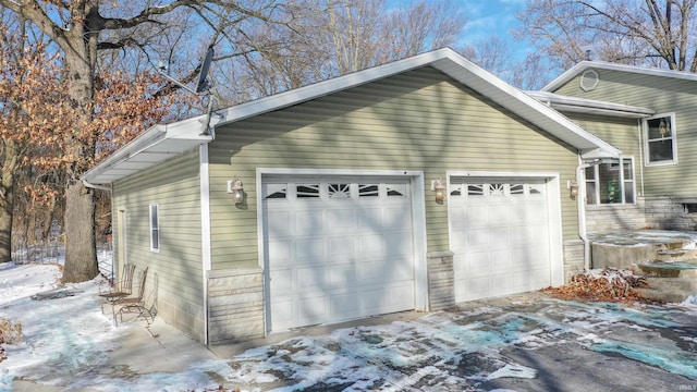 view of snow covered garage