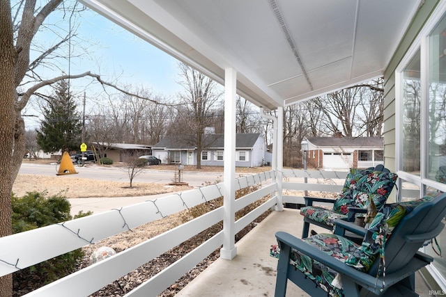 view of patio featuring a porch