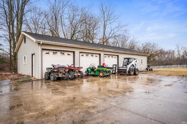 detached garage with fence