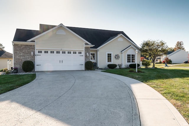 ranch-style house featuring a garage, brick siding, driveway, and a front yard