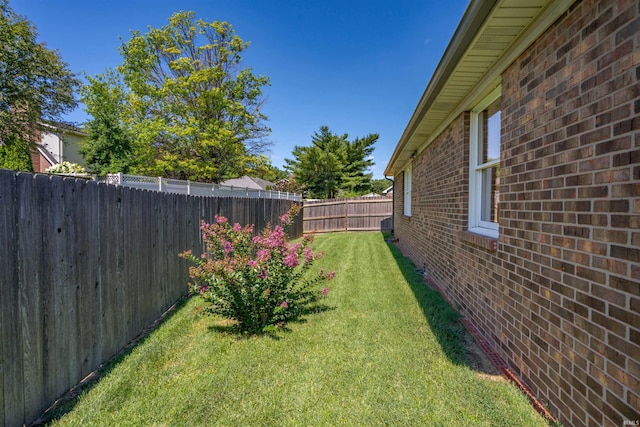 view of yard featuring a fenced backyard