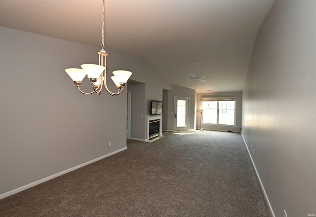 unfurnished living room featuring lofted ceiling, baseboards, a glass covered fireplace, and ceiling fan with notable chandelier