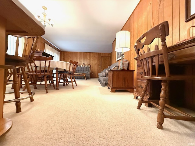 interior space featuring wooden walls and carpet flooring