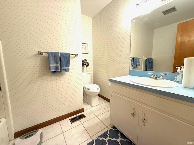 bathroom with tile patterned floors, visible vents, and wallpapered walls