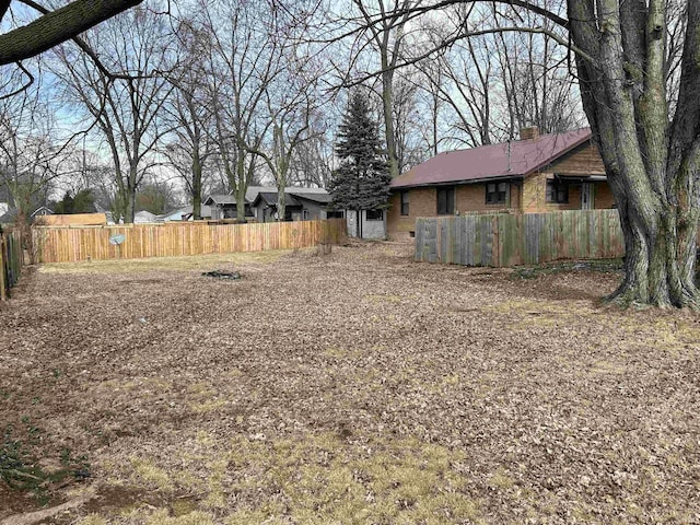 view of yard featuring fence