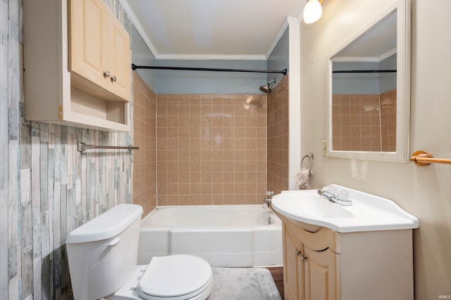 bathroom with ornamental molding, vanity, toilet, and shower / bathing tub combination