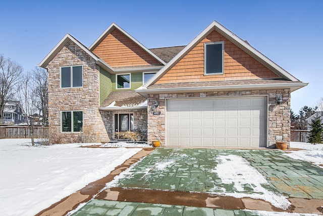 craftsman-style house featuring an attached garage