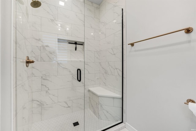 bathroom featuring a shower stall