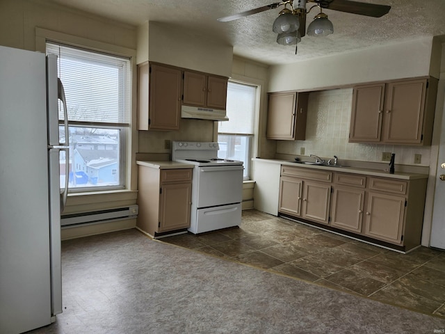 kitchen featuring a baseboard radiator, under cabinet range hood, white appliances, a sink, and light countertops