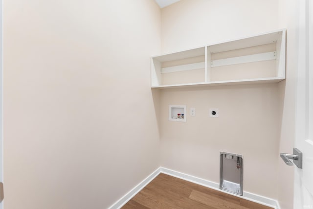 laundry room featuring laundry area, baseboards, wood finished floors, hookup for a washing machine, and hookup for an electric dryer