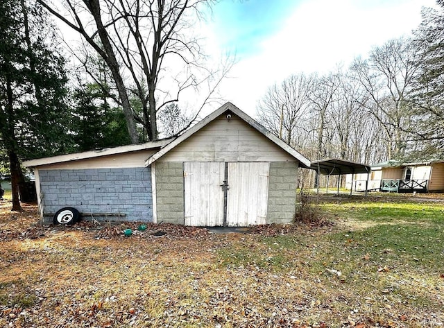 view of shed featuring a carport