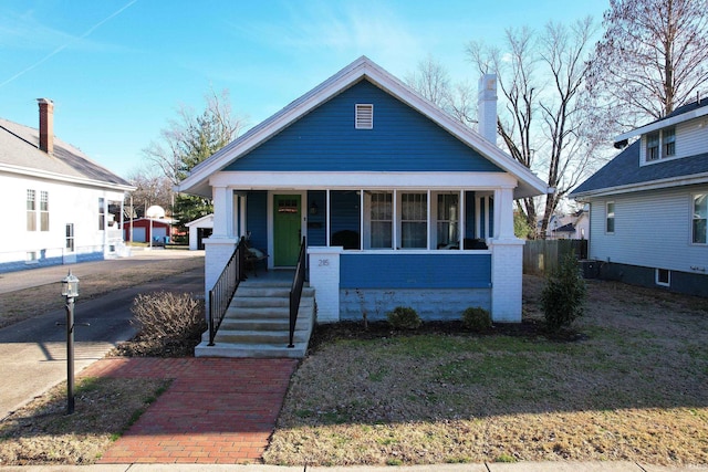 bungalow-style home featuring covered porch