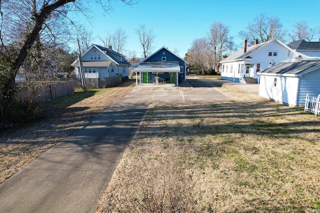 view of street with aphalt driveway