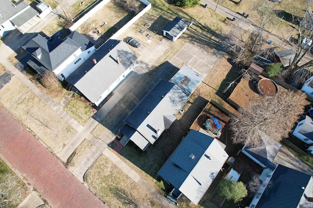 birds eye view of property with a residential view