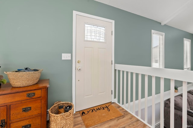 foyer entrance with light wood-style floors