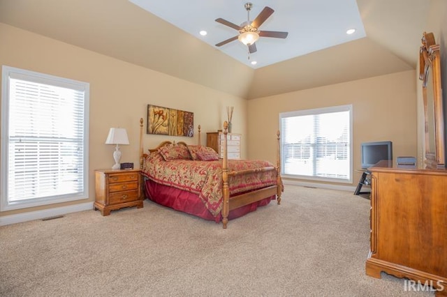 bedroom with recessed lighting, light carpet, vaulted ceiling, and visible vents