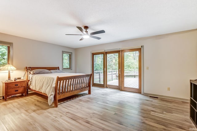 bedroom with access to exterior, ceiling fan, baseboards, and light wood finished floors