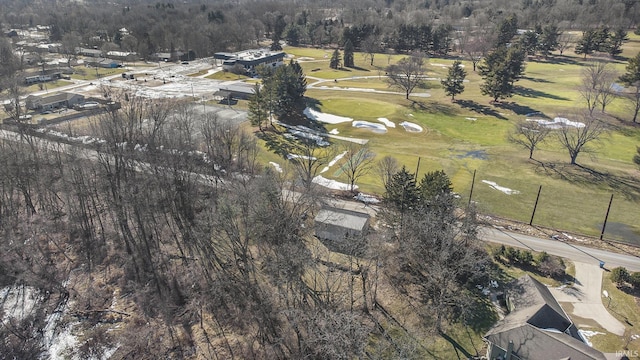 birds eye view of property with golf course view