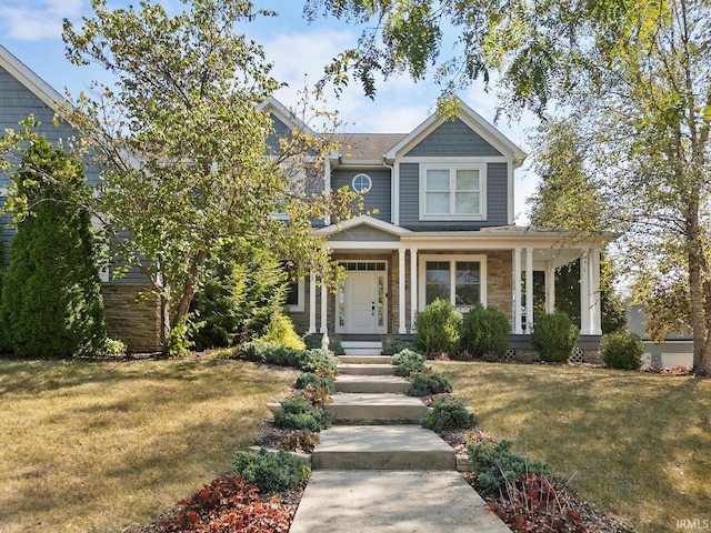 view of front of home with a front yard