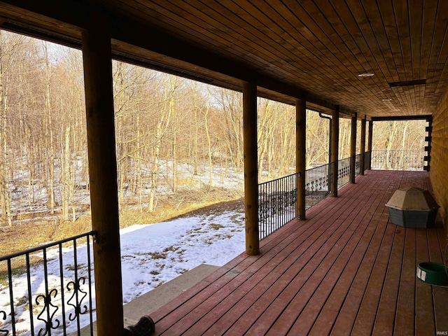 view of snow covered deck