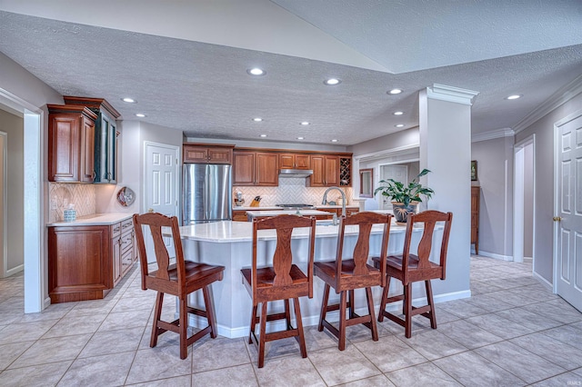 dining space featuring light tile patterned floors, baseboards, crown molding, a textured ceiling, and recessed lighting