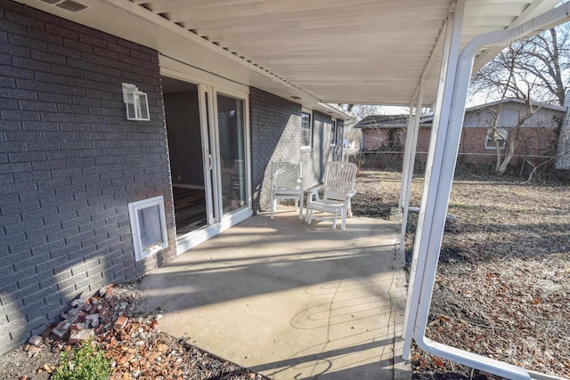 view of patio with fence