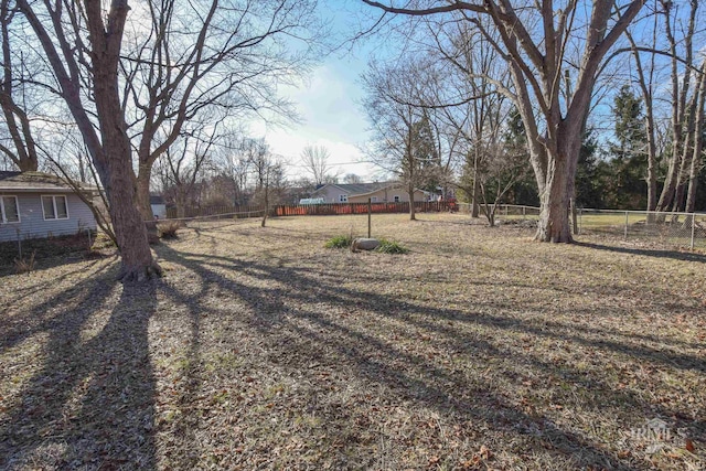 view of yard featuring fence