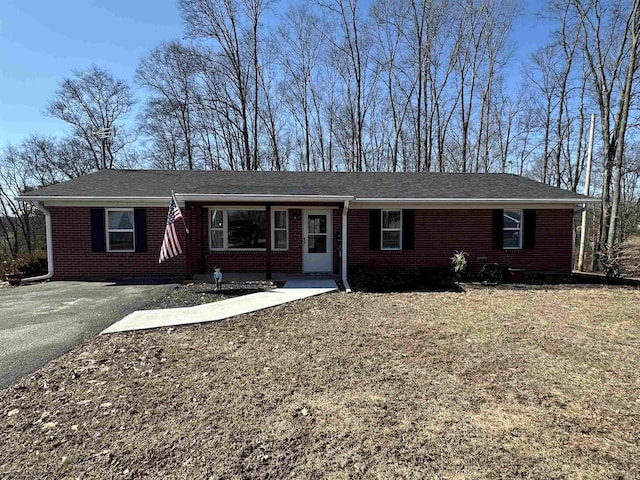 ranch-style house with brick siding