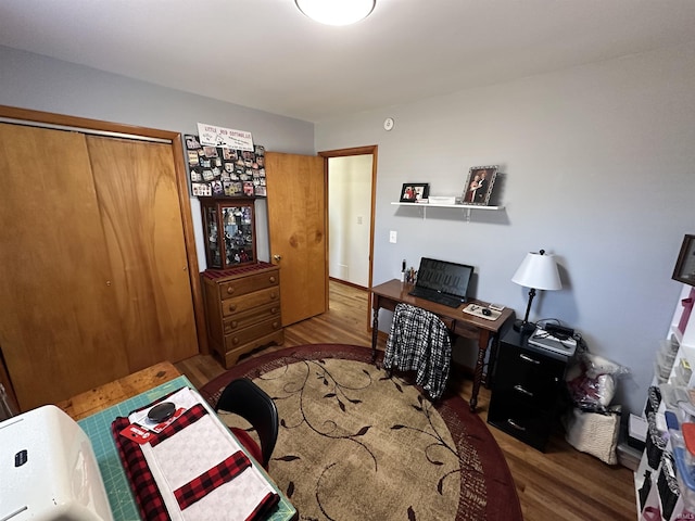 home office with wood finished floors