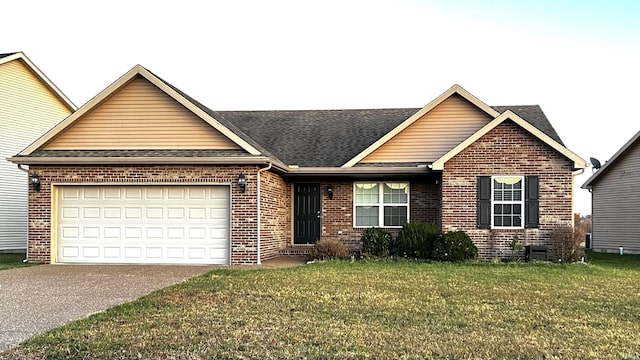 ranch-style home with a front lawn, brick siding, driveway, and an attached garage