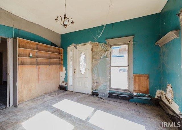 interior space with a chandelier